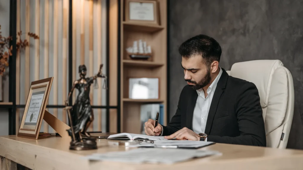 a cruise ship injury lawyer signing legal cruise ship lawsuit paperwork of a cruise ship injury victim
